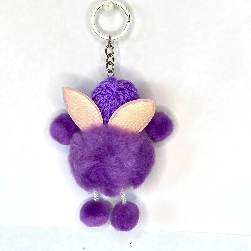 Sleepy baby with fairy wings‎ small pompon in purple keychain charm key holder
